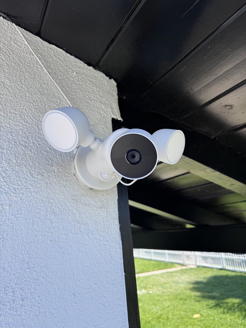 Nest floodlight camera mounted under an eave
