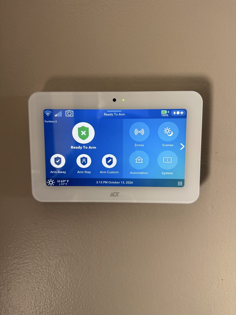 Close-up of an installed ADT touchscreen panel