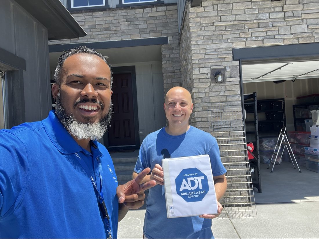 Your Home Safety specialist with a customer after an install